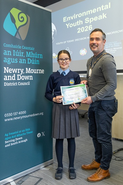 Council Chairperson, Councillor Philip Campbell, with Darcy O’Hare from St. Peter’s Primary School, Cloughreagh, Bessbrook.