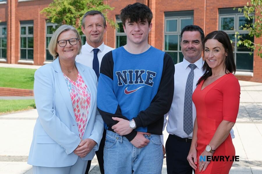 Euan O'Neill from Dromintee was the top A Level achiever at the Abbey Grammar School gaining 4 A*. Euan is pictured with from left: Gina Savage, Principal; Ronan Ruddy, Vice Principal; Mark Rogan, Head of Year 14 and Catriona O'Hare, Head of Senior School. Photograph: Columba O'Hare/ Newry.ie 