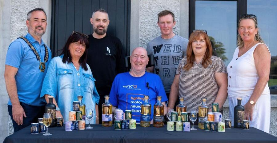Cearon Finnegan pictured with local political representatives at his awareness raising fundraiser for MND.