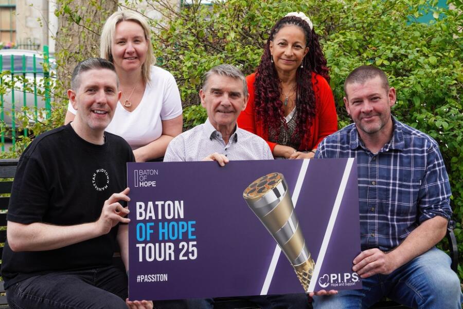 Front L-R: Paddy Hughes (EA Flare), Seamus McCabe (CEO, PIPS Hope & Support), Barry Traynor (SHSCT Promoting Wellbeing). Back L-R: Leeanne Carey (Changing Lives NI) and Najla Basketfield (PIPS Hope & Support) pictured encouraging participation in the Baton of Hope Tour 2025 in Newry, raising awareness around suicide prevention and mental health.