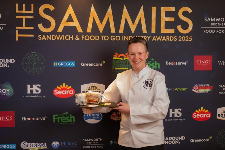 Deli Lites Donna McGuire with her Caribbean-inspired" Hoggin’ The Mojo” sandwich which secured her a spot as finalist in UK Sammies, Sandwich Designer of the Year. 