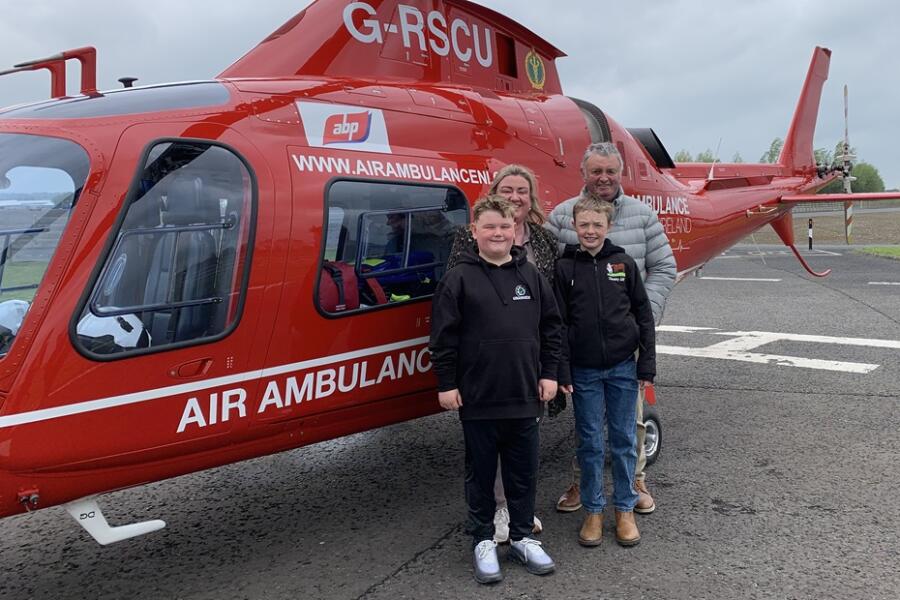 The Strain family pictured visiting the Air Ambulance Northern Ireland airbase in Lisburn. From left are: Kathryn, Shea, Dara and Kieran.