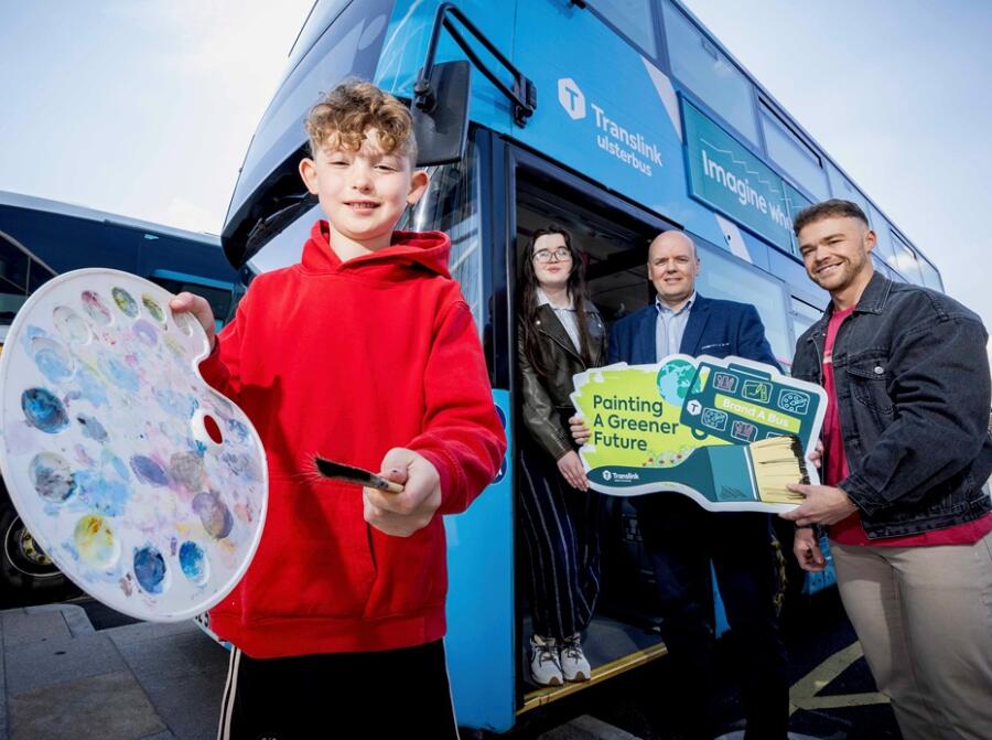 Translink has launched its 'Brand a Bus' competition Pictured at the launch are John Thompson, Head of Safety and Corporate Responsibility, Translink; Rory Quigg, Rory Quigg Illustration; Henry and Rebecca.