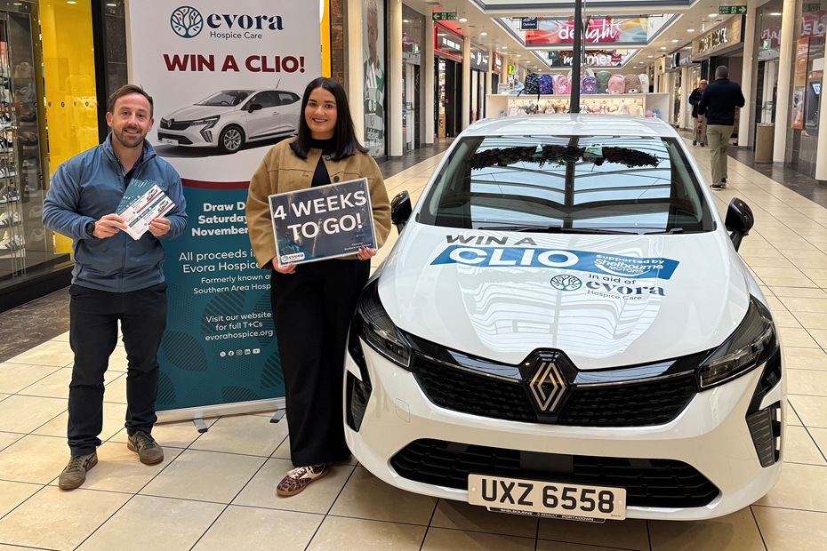James McCaffrey and Emma McGivern from Evora Hospice Fundraising Team reminding people to get their tickets for the Hospice Car Raffle.