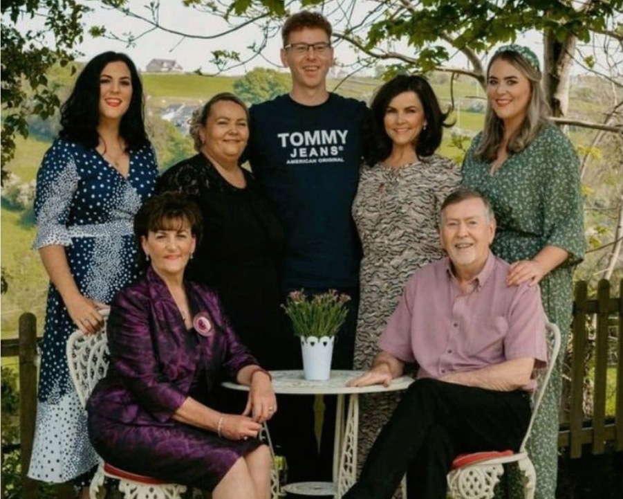 Sheila, front right pictured with her husband Henry and their five children