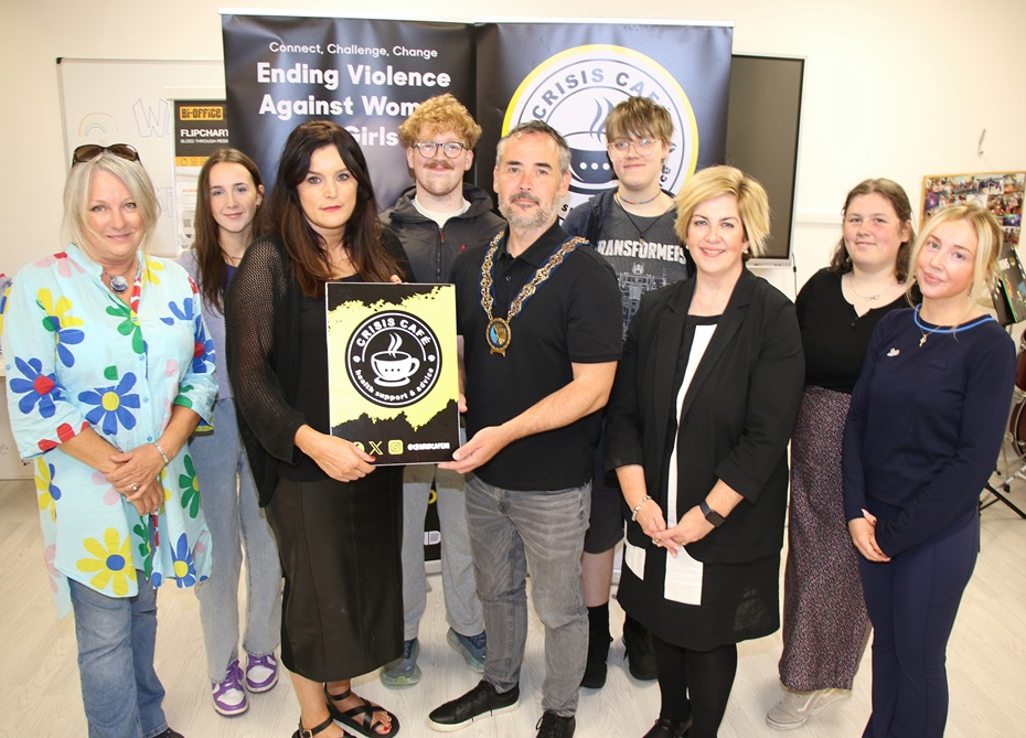 Newry, Mourne and Down District Council Chairperson, Councillor Phillip Campbell launches the EVAWG Project at the Crisis Café, Newry and is pictured with, from left: Laura Cummings Crisis Café Treasurer, Lauren Mallon Crisis Cafe Volunteer, Grainne Graham Crisis Café Co-Founder, Fionntán Gregory Crisis Café Board Member, Eddie Podgorna Crisis Café Volunteer, Martina Flynn Head of Engagement Newry, Mourne and Down District Council, Rachel McClurg Crisis Café Project Worker and Jorja Magee Crisis Café Group Facilitator. 