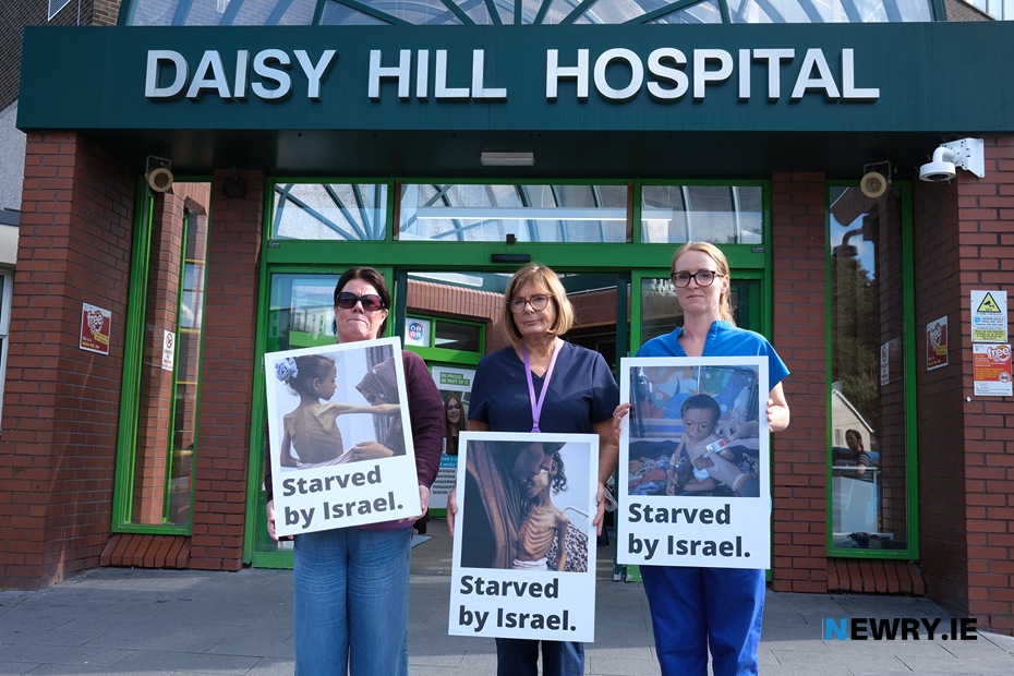 Healthcare workers holding a two minute silence outside Daisy Hill Hospital last month for the people of Gaza. Included are healthcare workers Aine McQuade, Deirdre Murphy and Fionna McDonald. Photograph: Columba O'Hare/ Newry.ie 