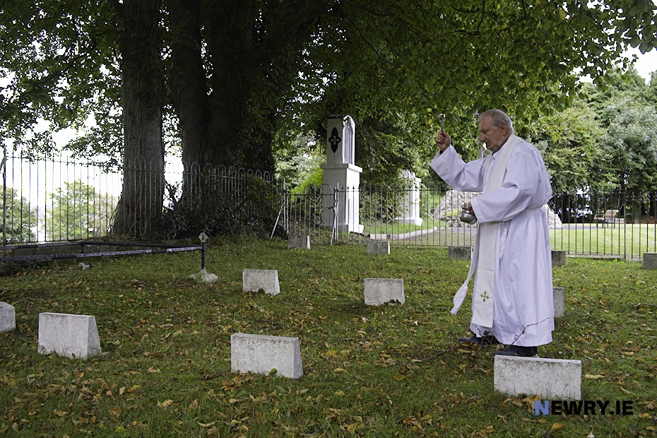 Fr Oliver Stanfield blesses the graves at St Jude's Shrine, Omeath. Photograph: Columba O'Hare/ Newry.ie 