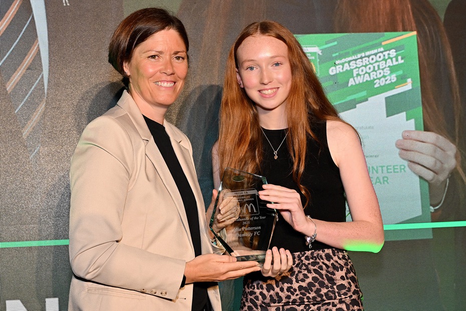Angela Platt, Director of Women's Football, Irish FA, left congratulates Mia Patterson from Damolly FC.