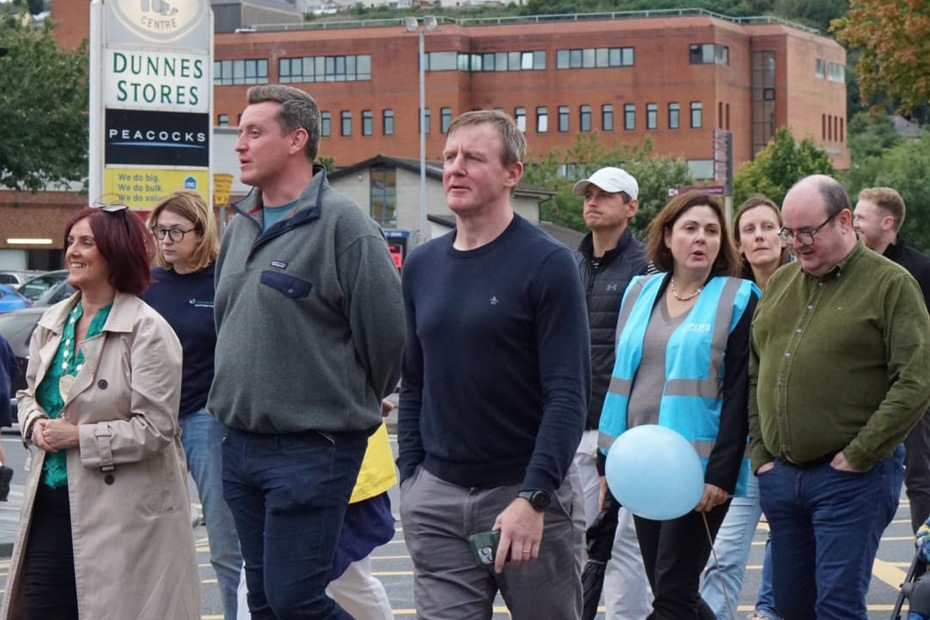 Justin McNulty MLA pictured on the Baton of Hope Community Walk Through Newry 
