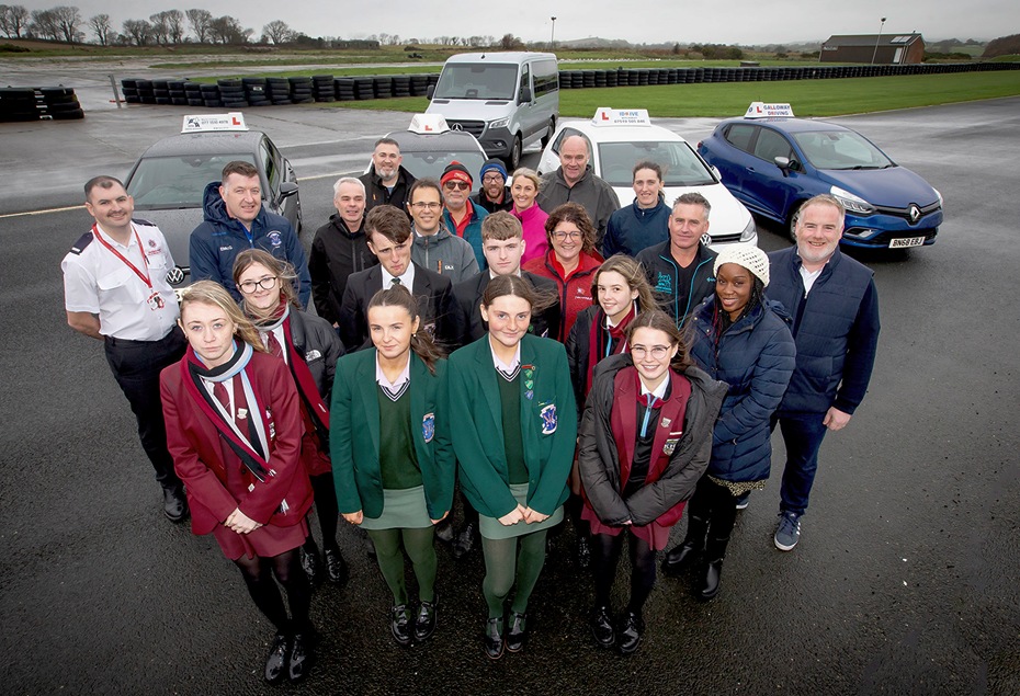 Kilkeel High School and St Louis Grammar School students pictured with representatives from the partner organisations who helped deliver the initiative.