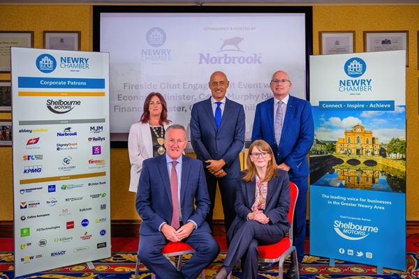 Speakers at the Chamber Fireside Chat engagement. Front from left: Conor Murphy MLA, Economy Minister and Caoimhe Archibald MLA, Finance Minister. Back: Edwina Flynn, President of Newry Chamber, Andrea Iucci, CEO of Norbrook Laboratories and Michael Savage, CEO of Newry Chamber.