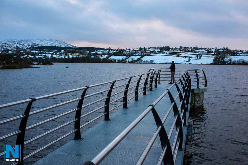 Last weeks snow has departed but for a brief spell the mountains and hills of Armagh and Down took on a new beauty. Here at Camlough Lake the new renovations make a perfect platform to observe the beauty of our local area. Photograph: Columba O'Hare/ www.newry.ie 