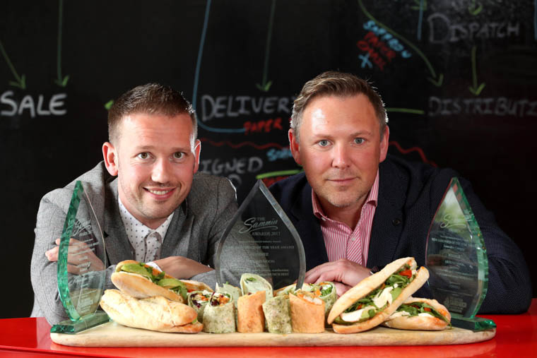  Gareth Chambers, left, CEO, and David Graham, Executive chef, from Around Noon, with the company's three Sammies.