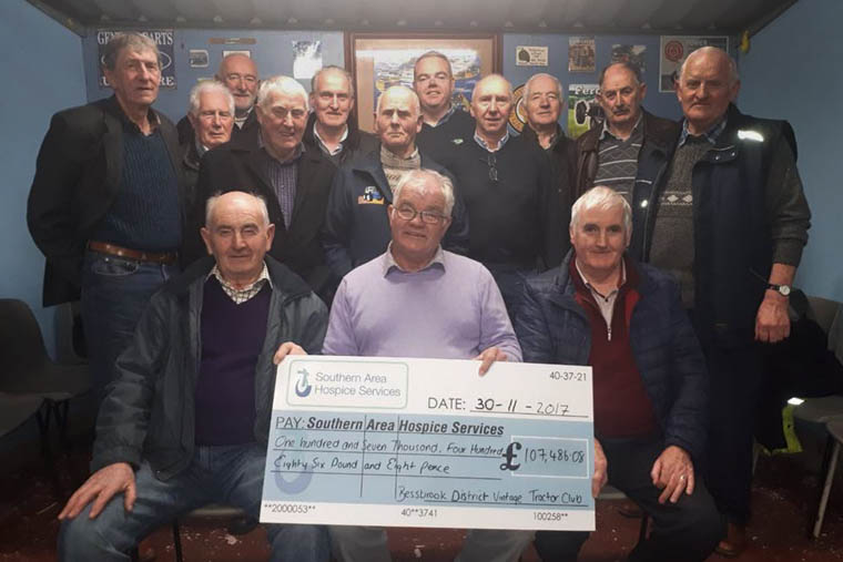 Members of Bessbrook District Vintage Tractor Club celebrate their fundraising for Southern Area Hospice which to date has raised over £100K Members of Bessbrook District Vintage Tractor Club celebrate their fundraising for Southern Area Hospice which to date has raised over £100K