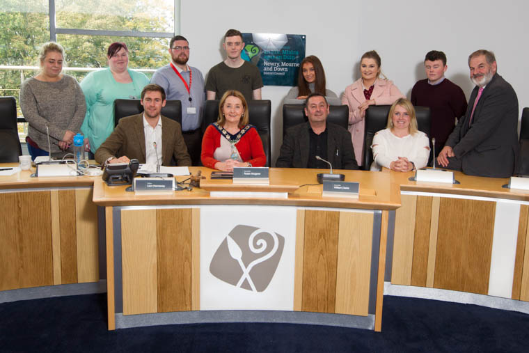 Councillor John Trainor, back 3rd from left, with Students from SRC Newry SERC, Downpatrick and SERC Bangor taking part in the Question Time event at the Council Offices, Downpatrick as part of Local Democracy Week. Front from left Councillor Patrick Brown, Newry, Mourne and Down District Council Chairperson, Councillor Roisin Mulgrew, Councillor William Clarke, Councillor Jill Macauley and Councillor Garth Craig who also took part in the debate. Councillor John Trainor, back 3rd from left, with Students from SRC Newry SERC, Downpatrick and SERC Bangor taking part in the Question Time event at the Council Offices, Downpatrick as part of Local Democracy Week. Front from left Councillor Patrick Brown, Newry, Mourne and Down District Council Chairperson, Councillor Roisin Mulgrew, Councillor William Clarke, Councillor Jill Macauley and Councillor Garth Craig who also took part in the debate.