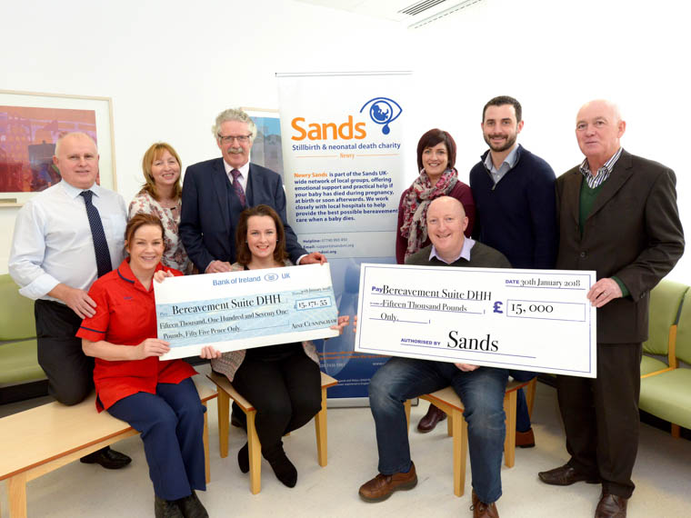 Staff Midwife Aine Cunningham and Steven Guy from Sands handover their donations to the Southern Trust Maternity and Estates teams to begin work on the new bereavement suite. Front l-r Mairead Finnegan, Delivery Suite Sister, Aine Cunningham, Staff Midwife, Steven Guy, Sands. Back l-r Dennis Quinn, Estates, Joanne McGlade, Lead Midwife, Mr David Sim, Clinical Director, Shivaun McKinley, Sands Volunteer, Steven Johnston and Patrick Connolly, Estates. Staff Midwife Aine Cunningham and Steven Guy from Sands handover their donations to the Southern Trust Maternity and Estates teams to begin work on the new bereavement suite. Front l-r Mairead Finnegan, Delivery Suite Sister, Aine Cunningham, Staff Midwife, Steven Guy, Sands. Back l-r Dennis Quinn, Estates, Joanne McGlade, Lead Midwife, Mr David Sim, Clinical Director, Shivaun McKinley, Sands Volunteer, Steven Johnston and Patrick Connolly, Estates.