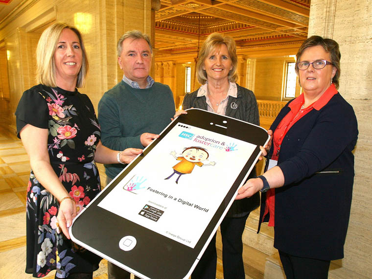 A new Health and Social Care (HSC) App for HSC foster carers was launched earlier this year. Patricia Mulholland, South Eastern Trust, Paul Cunningham Southern Trust, Gemma Fitzsimmons, Southern Trust & Una Carragher, Regional Fostering & Adoption Service are pictured with the app which is currently available for download from Android and Apple stores for all HSC foster carers.
