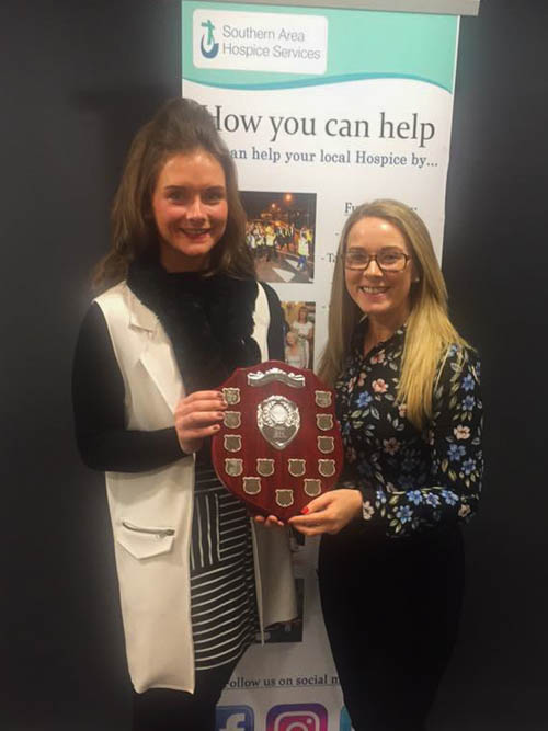 Jolene O'Hare, captain of the winning team is presented with their award. Jolene O'Hare, captain of the winning team is presented with their award.