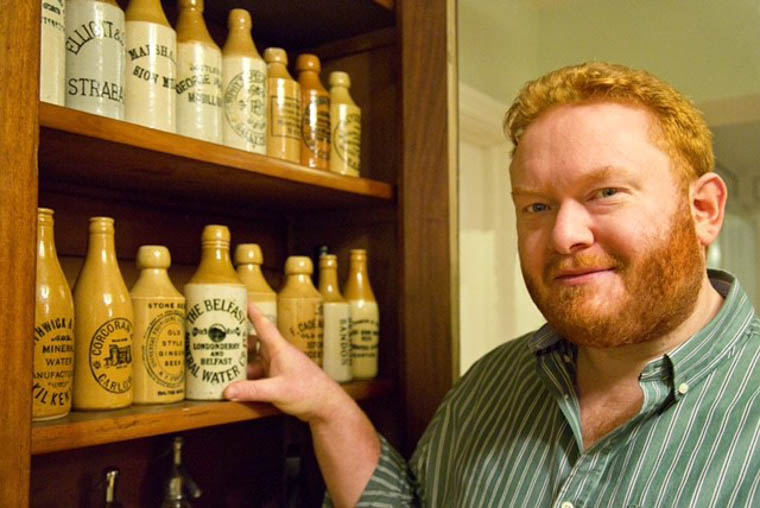 Neil Reid with some of his impressive collection of stone bottles and jars. Neil Reid with some of his impressive collection of stone bottles and jars.
