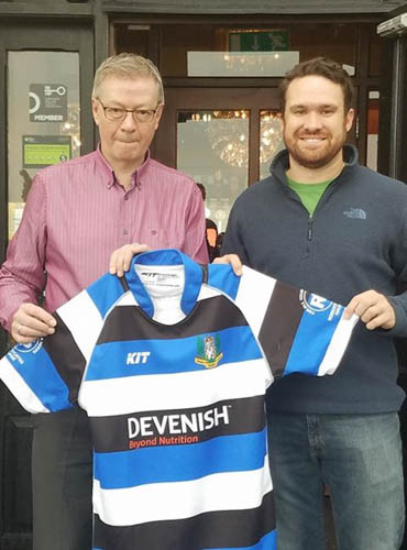 Colm McAvoy from the Bridge Bar presents a Newry Rugby top to Southern Pines resident Hunter Parris on his visit to Newry. Colm McAvoy from the Bridge Bar presents a Newry Rugby top to Southern Pines resident Hunter Parris on his visit to Newry.