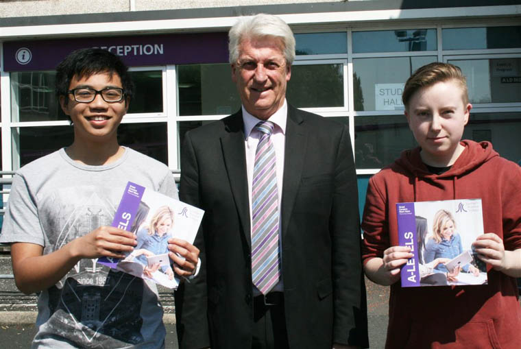 Head of School Michael McDonald with A Level students Janssen Garcia and Miles O’Neill