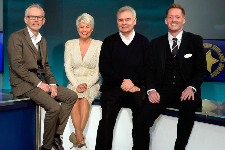 Specsavers representatives Tony McGinn (left) and Stuart Brown (right) with Spirit of NI presenter Pamela Ballantine and judge Eamonn Holmes. Photograph: Stephen Hamilton Specsavers representatives Tony McGinn (left) and Stuart Brown (right) with Spirit of NI presenter Pamela Ballantine and judge Eamonn Holmes. Photograph: Stephen Hamilton