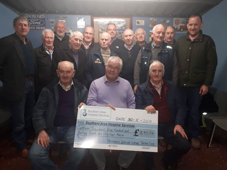 Members of Bessbrook District Vintage Tractor Club with their cheque for the Southern Area Hospice.