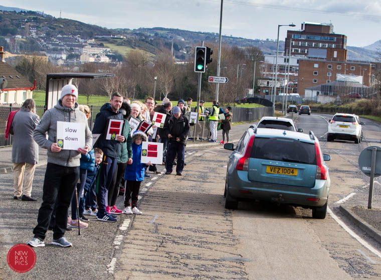 Urging motorists to slow down and the Saoradh protest on the Camlough Road. Photograph: NewRayPics.com Urging motorists to slow down and the Saoradh protest on the Camlough Road. Photograph: NewRayPics.com