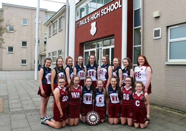 Abbi McVerry (Centre) Captain pictured with her team and The Regina Millen Shield Abbi McVerry (Centre) Captain pictured with her team and The Regina Millen Shield