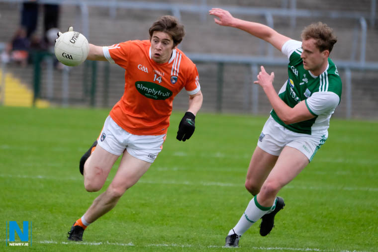 Armagh's Andrew Murnin with Fermanagh's Lee Cullen in pursuit. Photograph: Columba O'Hare/ Newry.ie