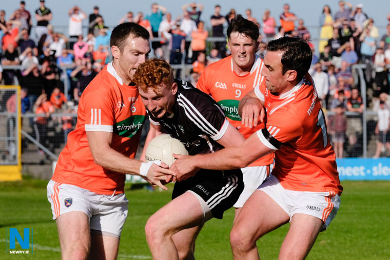 Armagh's Brendan Donaghy, Connaire Mackin and Niall Rowland close in on Sligo's Se&aacute;n Carrabine at Markievicz Park. Photograph: Columba O'Hare/ Newry.ie