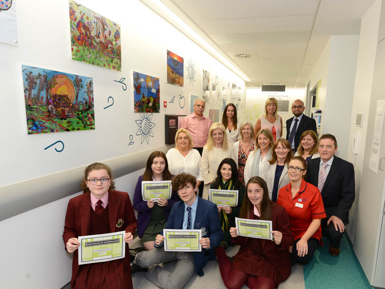 Staff from The Daisy Children and Young People’s Unit with students who designed wall murals and their teachers and parents. Students are Maria Merendino and Niamh McGreevy from St Mary’s High School, Aoibhean Freeburn from St Louis Grammar School, Freddie Freeburn, St Colman’s Grammar and Brea Freeburn from the Sacred Heart Grammar. Staff from The Daisy Children and Young People’s Unit with students who designed wall murals and their teachers and parents. Students are Maria Merendino and Niamh McGreevy from St Mary’s High School, Aoibhean Freeburn from St Louis Grammar School, Freddie Freeburn, St Colman’s Grammar and Brea Freeburn from the Sacred Heart Grammar.