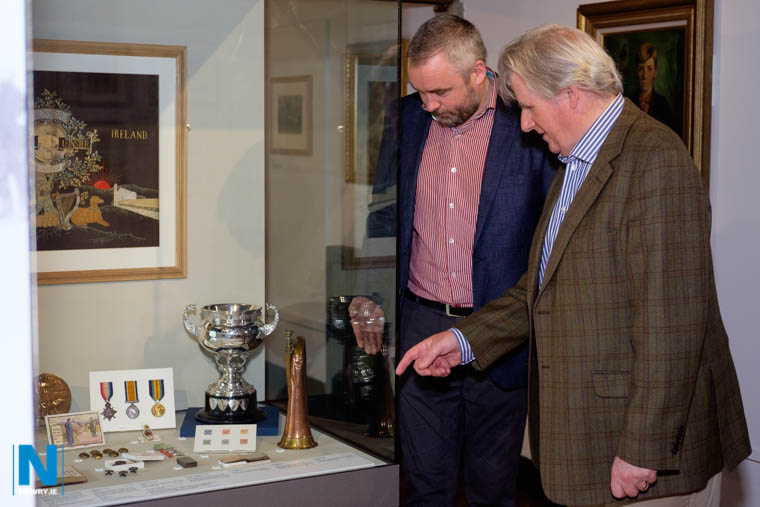 Sean and Jonathan Donnelly look over a display case in the newly refurbished Newry Museum, containing items from the Eamon Donnelly Collection including an autograph book with Michael Collin's signature. Photograph: Columba O'Hare/ Newry.ie Sean and Jonathan Donnelly look over a display case in the newly refurbished Newry Museum, containing items from the Eamon Donnelly Collection including an autograph book with Michael Collin's signature. Photograph: Columba O'Hare/ Newry.ie