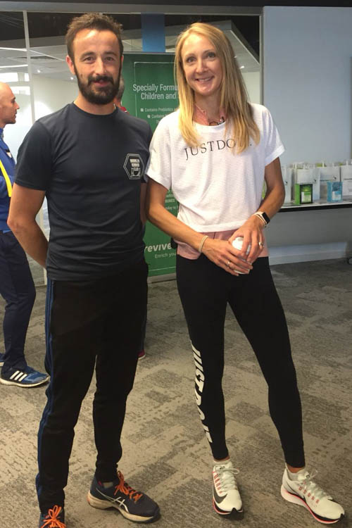 John McCaffrey with Paula Radcliffe at the Laganside 10k
