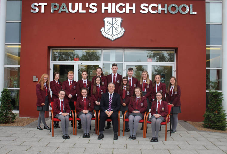 Top achievers at the St Paul's High School Prize Night. Back from left: Niamh Murphy, Tara Phillips, Liam Manly, Conor Murphy, Hannah Quinn, Jason McVerry, Conor Cinnamond, Cailiosa Ni Dhuill, Aoife Phillips, Tara Hollywood. Middle: Caoimhe Hanrahan and Orla Cromie. Front: Emma Mallon, Ciara O&rsquo;Hagan, Jarlath Burns (Principal), Blinne McAteer and Sarah Mallon. Missing from the Photograph are Rhiannon Noade and Niamh Markey.