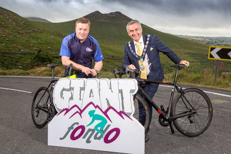 Stephen Laird, Chain Reaction Cycles with Cllr Mark Murnin, Chairman, Newry, Mourne and Down Council at the launch of the Giant Fondu event. Photograph: NewRayPics.com