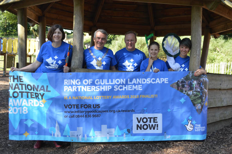 Abby McSherry, Project Officer for the Ring of Gullion Landscape Partnership Scheme, Newry, Mourne and Down District Council Chairman, Councillor Mark Murnin, Des Murphy, Chairperson of the Ring of Gullion Landscape Partnership Scheme and Ring of Gullion volunteers, Alannah and Claire Voight, Claire who are asking everyone to VOTE NOW for Ring of Gullion Landscape Partnership to win Best Environment Project at this year's National Lottery Awards. Abby McSherry, Project Officer for the Ring of Gullion Landscape Partnership Scheme, Newry, Mourne and Down District Council Chairman, Councillor Mark Murnin, Des Murphy, Chairperson of the Ring of Gullion Landscape Partnership Scheme and Ring of Gullion volunteers, Alannah and Claire Voight, Claire who are asking everyone to VOTE NOW for Ring of Gullion Landscape Partnership to win Best Environment Project at this year's National Lottery Awards.