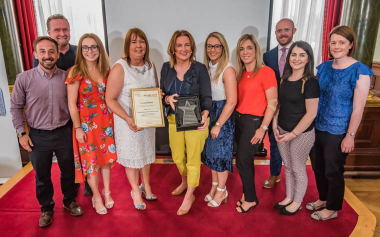 The Hospice team pictured receiving the Fundraising Team of the Year award from Peter Lewis, back left. CEO Institute of Fundraising and Barra Best, event Compere. Pictured front from left: James McCaffrey, Amy Henshaw, Majella Gollogly, Siobhan McArdle, Grainne Mulgrew, Denise Doyle, Josephine Keenan and Anne MacOscar. The Hospice team pictured receiving the Fundraising Team of the Year award from Peter Lewis, back left. CEO Institute of Fundraising and Barra Best, event Compere. Pictured front from left: James McCaffrey, Amy Henshaw, Majella Gollogly, Siobhan McArdle, Grainne Mulgrew, Denise Doyle, Josephine Keenan and Anne MacOscar.