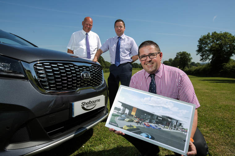 Shelbourne Motors has announced a partnership with Kia Motors (UK) to bring the global car manufacturer to its new £5m Newry complex. Kia is the first manufacturer to be confirmed for the family-owned vehicle retailer’s new state-of-the-art multi-franchise facility that’s scheduled to open in early 2019. Pictured are from left: Nigel Flude, Regional Franchising Manager at Kia Motors (UK); Richard Ward, Sales Director at Shelbourne Motors and Paul Ward, Sales Director at Shelbourne Motors. Photograph: Brian Thompson Photography Shelbourne Motors has announced a partnership with Kia Motors (UK) to bring the global car manufacturer to its new £5m Newry complex. Kia is the first manufacturer to be confirmed for the family-owned vehicle retailer’s new state-of-the-art multi-franchise facility that’s scheduled to open in early 2019. Pictured are from left: Nigel Flude, Regional Franchising Manager at Kia Motors (UK); Richard Ward, Sales Director at Shelbourne Motors and Paul Ward, Sales Director at Shelbourne Motors. Photograph: Brian Thompson Photography