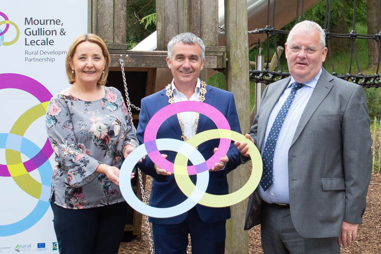 Announcing a £1 million funding package to upgrade 16 rural play parks are Mourne, Gullion and Lecale Rural Development Partnership Chairperson, Councillor Roisin Mulgrew, Newry, Mourne and Down District Council Chairman, Councillor Mark Murnin and Jerome Burns from the Department of Agricultural, Environment and Rural Affairs. Announcing a £1 million funding package to upgrade 16 rural play parks are Mourne, Gullion and Lecale Rural Development Partnership Chairperson, Councillor Roisin Mulgrew, Newry, Mourne and Down District Council Chairman, Councillor Mark Murnin and Jerome Burns from the Department of Agricultural, Environment and Rural Affairs.
