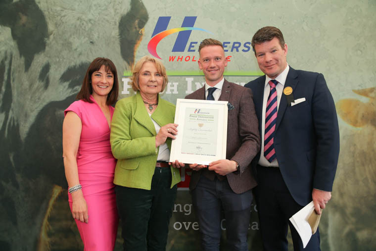 Newry based food-to-go company Around Noon picked up a highly commended award in the Excellence in Regional Delivery category at the inaugural Henderson Wholesale Fresh Innovation Awards held during the Balmoral Show. The awards celebrate Henderson’s fresh food suppliers, farmers and growers and reward their product innovation, accessibility of goods and sustainable practices. Farming and agri-food expert Freda Magill (2nd left) presents the award to Gareth Chambers (centre) from Around Noon. Also pictured is Neal Kelly (right) Henderson Wholesale Fresh Foods Director and awards host, BBC’s Jo Scott (left). Newry based food-to-go company Around Noon picked up a highly commended award in the Excellence in Regional Delivery category at the inaugural Henderson Wholesale Fresh Innovation Awards held during the Balmoral Show. The awards celebrate Henderson’s fresh food suppliers, farmers and growers and reward their product innovation, accessibility of goods and sustainable practices. Farming and agri-food expert Freda Magill (2nd left) presents the award to Gareth Chambers (centre) from Around Noon. Also pictured is Neal Kelly (right) Henderson Wholesale Fresh Foods Director and awards host, BBC’s Jo Scott (left).