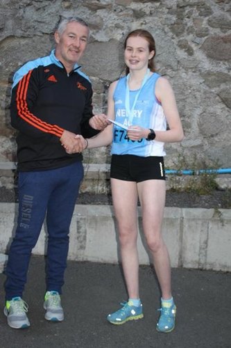 Meadow McCauley lifting 1st overall in Rathfriland 5k Meadow McCauley lifting 1st overall in Rathfriland 5k