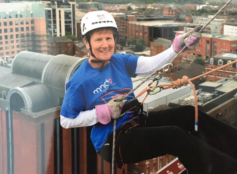 Anne Sleith at the top ready to abseil down the Europa. Anne Sleith at the top ready to abseil down the building.