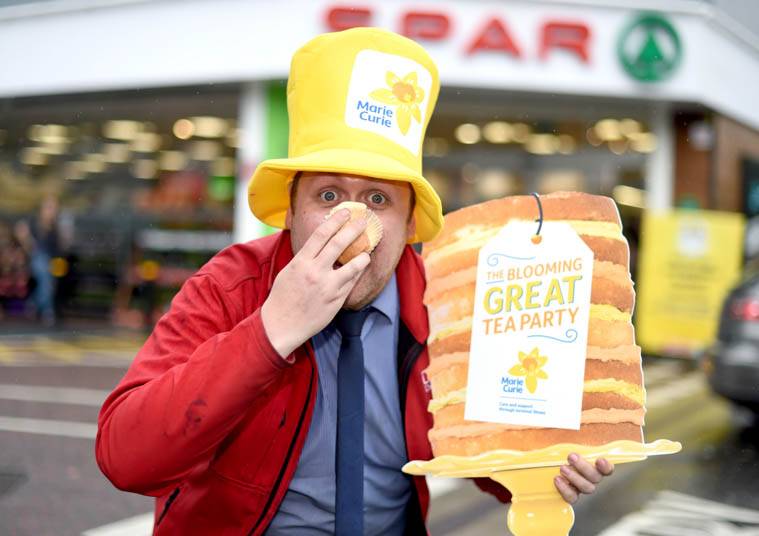 Spar store manager, Chris Sewell gets ready for the Blooming Great Tea Party in aid of Marie Curie, happening at over 200 SPAR stores locally this Saturday 16 June. Spar store manager, Chris Sewell gets ready for the Blooming Great Tea Party in aid of Marie Curie, happening at over 200 SPAR stores locally this Saturday 16 June.