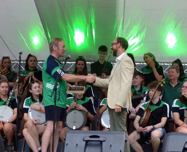 Des Murphy presenting the Mayor of Sitges, Miquel Forns with a plaque made by Mullaghbawn man Padraig Carragher.