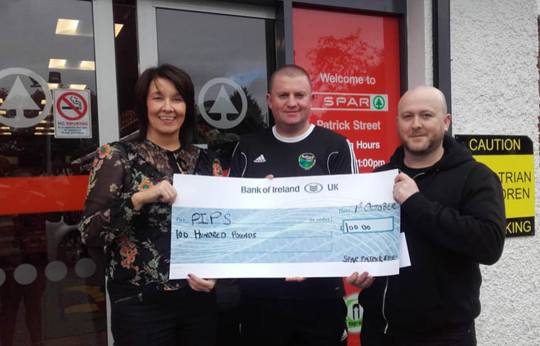 Colette Byrne, Proprietor, Spar Patrick Street with Gavin and Declan from Rathore.