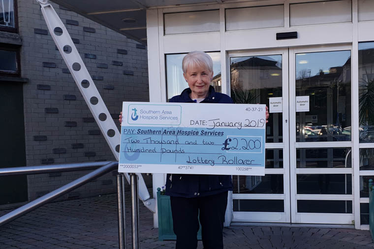 Ann Hughes with her Hospice Lottery win. Ann Hughes with her Hospice Lottery win.