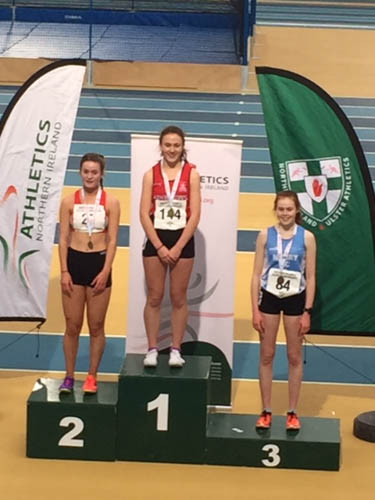 Meadow McCauley (Right) lifting a Bronze Medal in the U17s 800m at the NI/Ulster Indoor Championships 