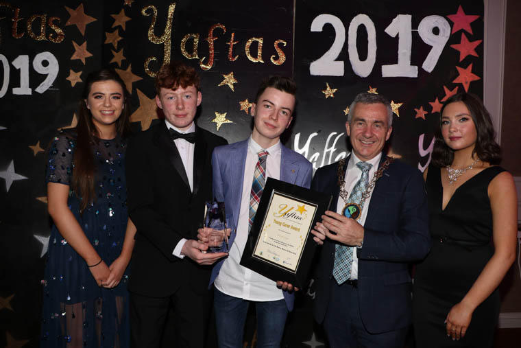 YAFTAS Young Carer Award for a person who devotes much of their time and energy to caring and supporting a friend of relative who needs additonal or extra support. Winner of Young Carer Award was Ben McGlade who looks after his Mum Eimear and brother Joshua. l-r Annabelle Heaney Sponsor P.J O'Hare Carlingford, Concher Fitzsimmons Down Area Youth Council, Award Winner Ben McGlade, Chairman Newry, Mourne and Down District Council, Councillor Mark Murnin and Molly Brady Newry and Mourne Youth Council.